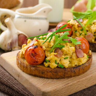 Breakfast toast with eggs and speck Handl Tyrol